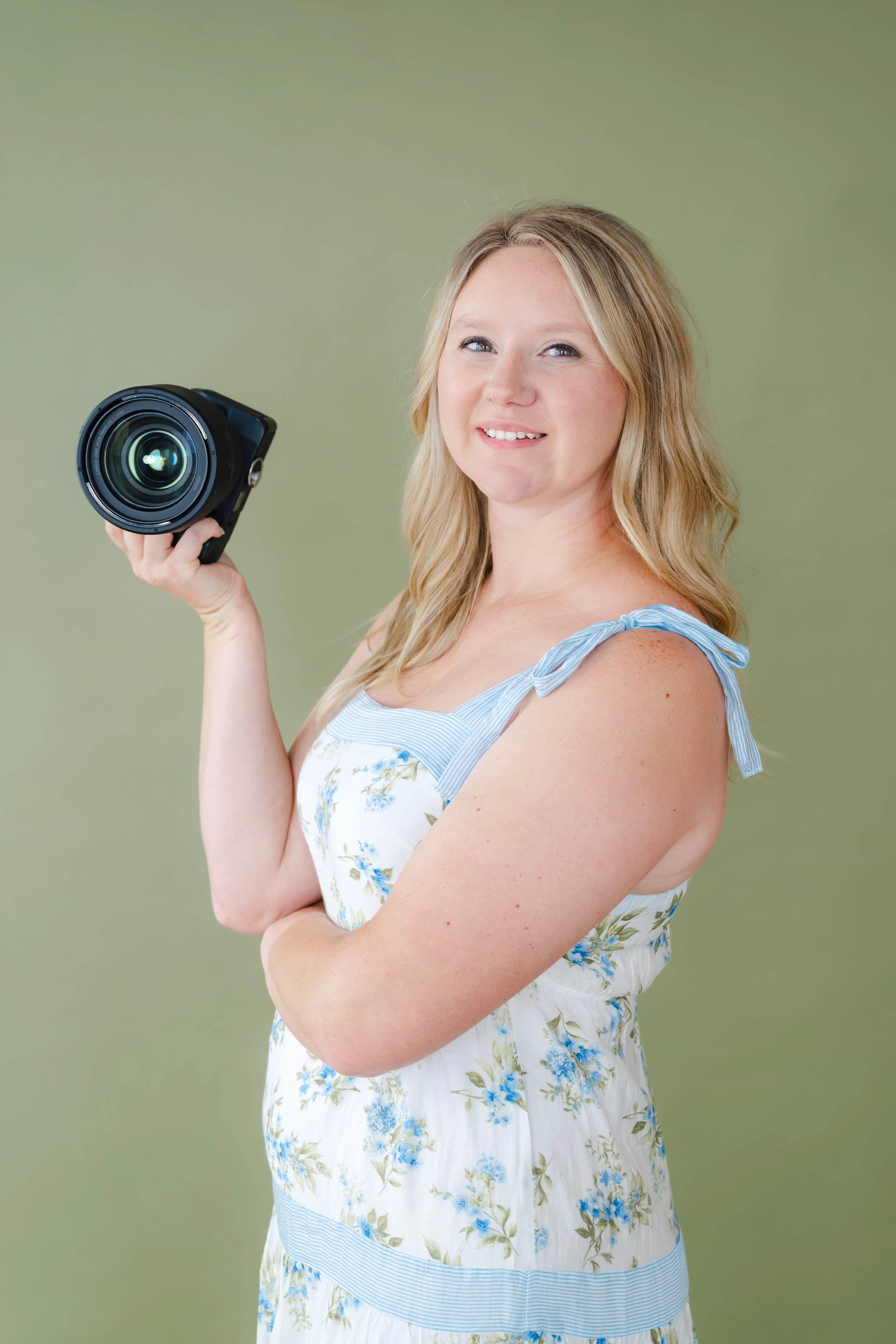 Jessica, JB Squared Photography, holding her camera